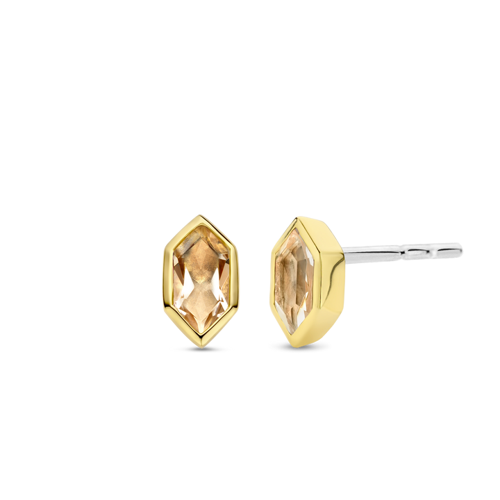 Photo of Hex CZ Studs in a decorative scene, designed by , available at Plumb Gold & Plumb Silver