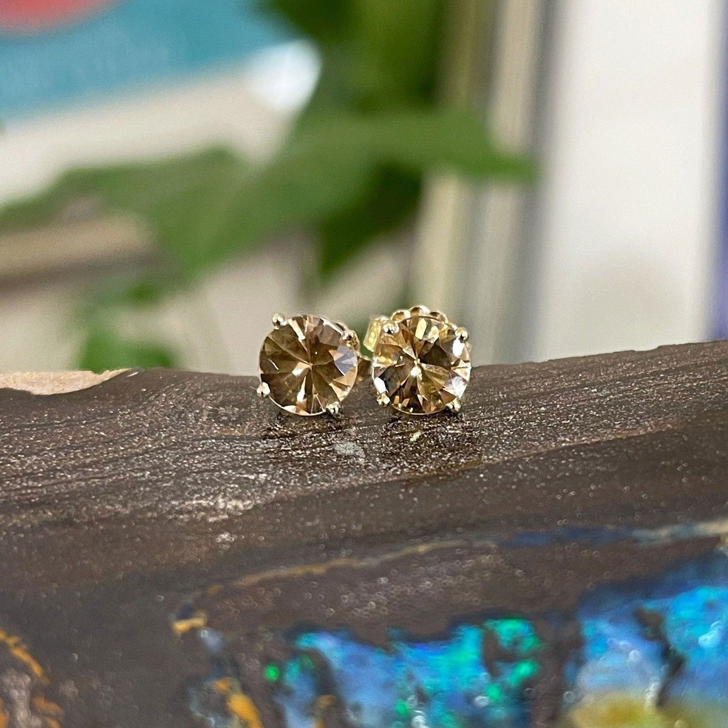 Photo of Imperial Topaz Studs in a decorative scene, designed by -, available at Plumb Gold & Plumb Silver
