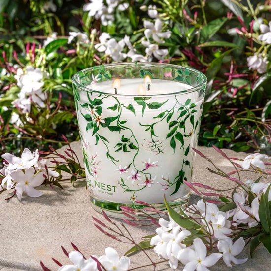 Photo of Indian Jasmine Candle in a decorative scene, designed by , available at Plumb Gold & Plumb Silver