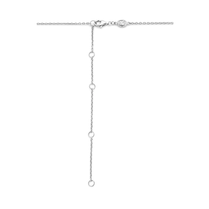 Photo of Interlocking Circles Necklace in a decorative scene, designed by -, available at Plumb Gold & Plumb Silver