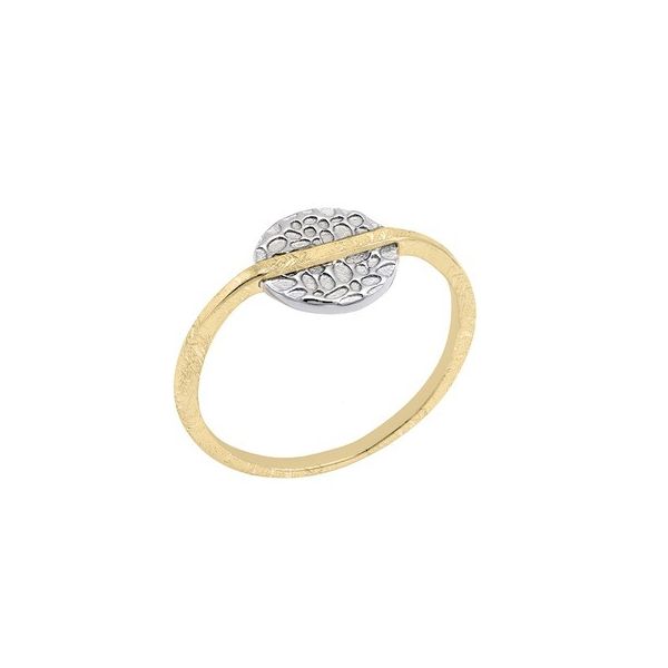 Photo of “Kymbal” Ring in a decorative scene, designed by , available at Plumb Gold & Plumb Silver