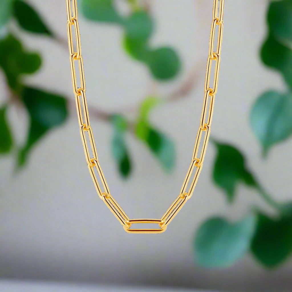 Photo of Large Paperclip Chain in a decorative scene, designed by -, available at Plumb Gold & Plumb Silver