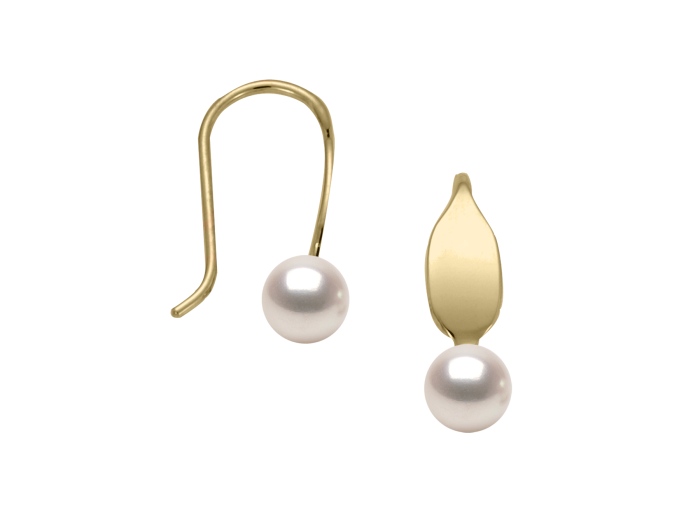 Photo of Le Petite Pearl Earring in a decorative scene, designed by , available at Plumb Gold & Plumb Silver