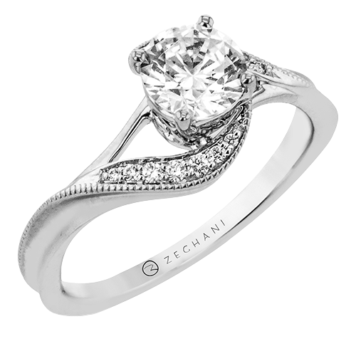 Photo of "Magnolia" Curve Bypass Engagement Ring in a decorative scene, designed by , available at Plumb Gold & Plumb Silver