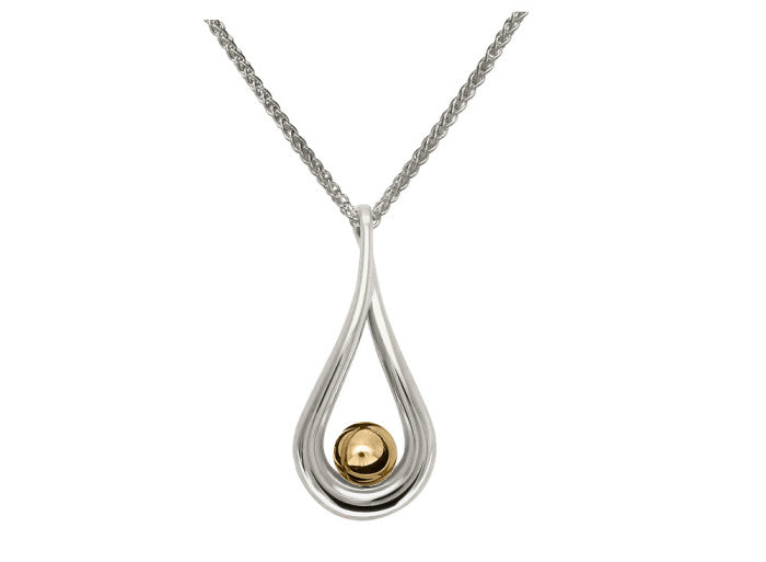 Photo of "Mana" Necklace in a decorative scene, designed by , available at Plumb Gold & Plumb Silver