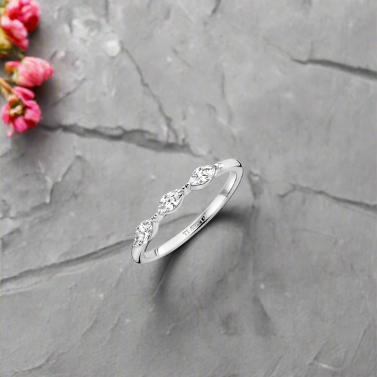 Photo of Marquise Cz Ring in a decorative scene, designed by -, available at Plumb Gold & Plumb Silver