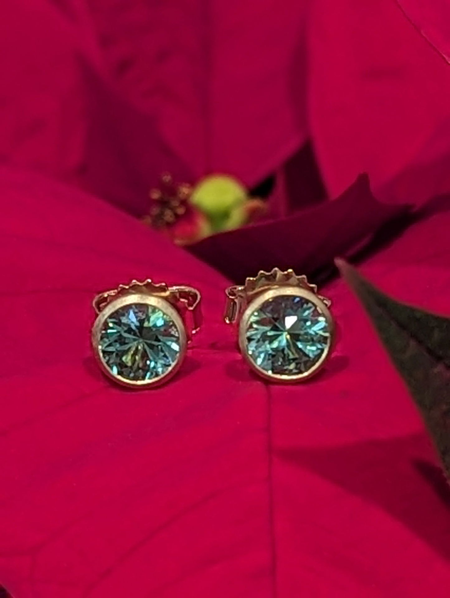 Photo of Mint Tourmaline Studs in a decorative scene, designed by , available at Plumb Gold & Plumb Silver
