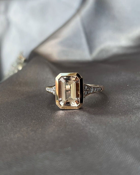 Photo of Morganite Ring in a decorative scene, designed by , available at Plumb Gold & Plumb Silver