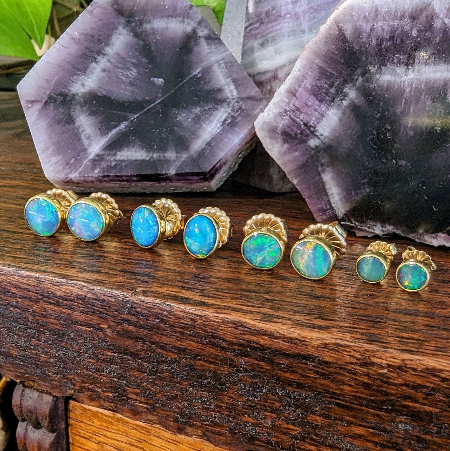 Photo of Opal Studs in a decorative scene, designed by , available at Plumb Gold & Plumb Silver