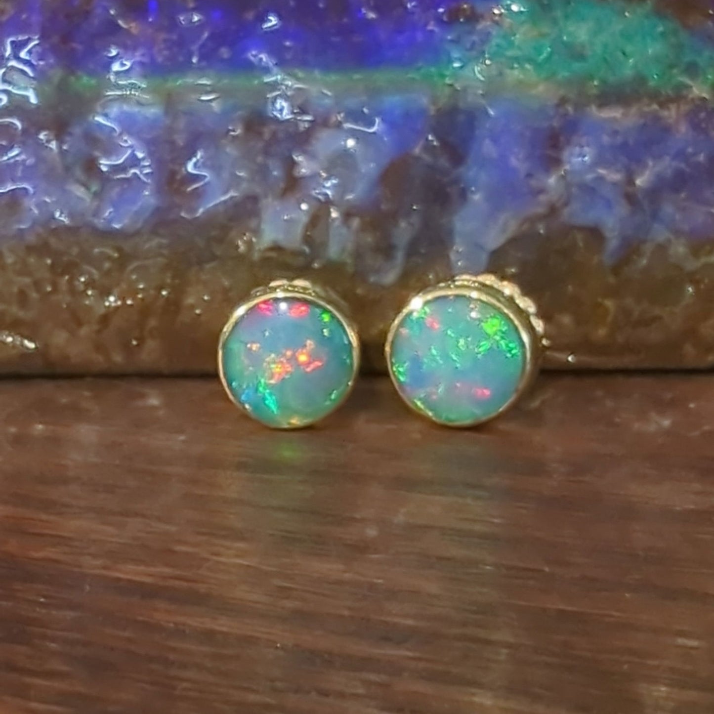 Photo of Opal Studs in a decorative scene, designed by , available at Plumb Gold & Plumb Silver