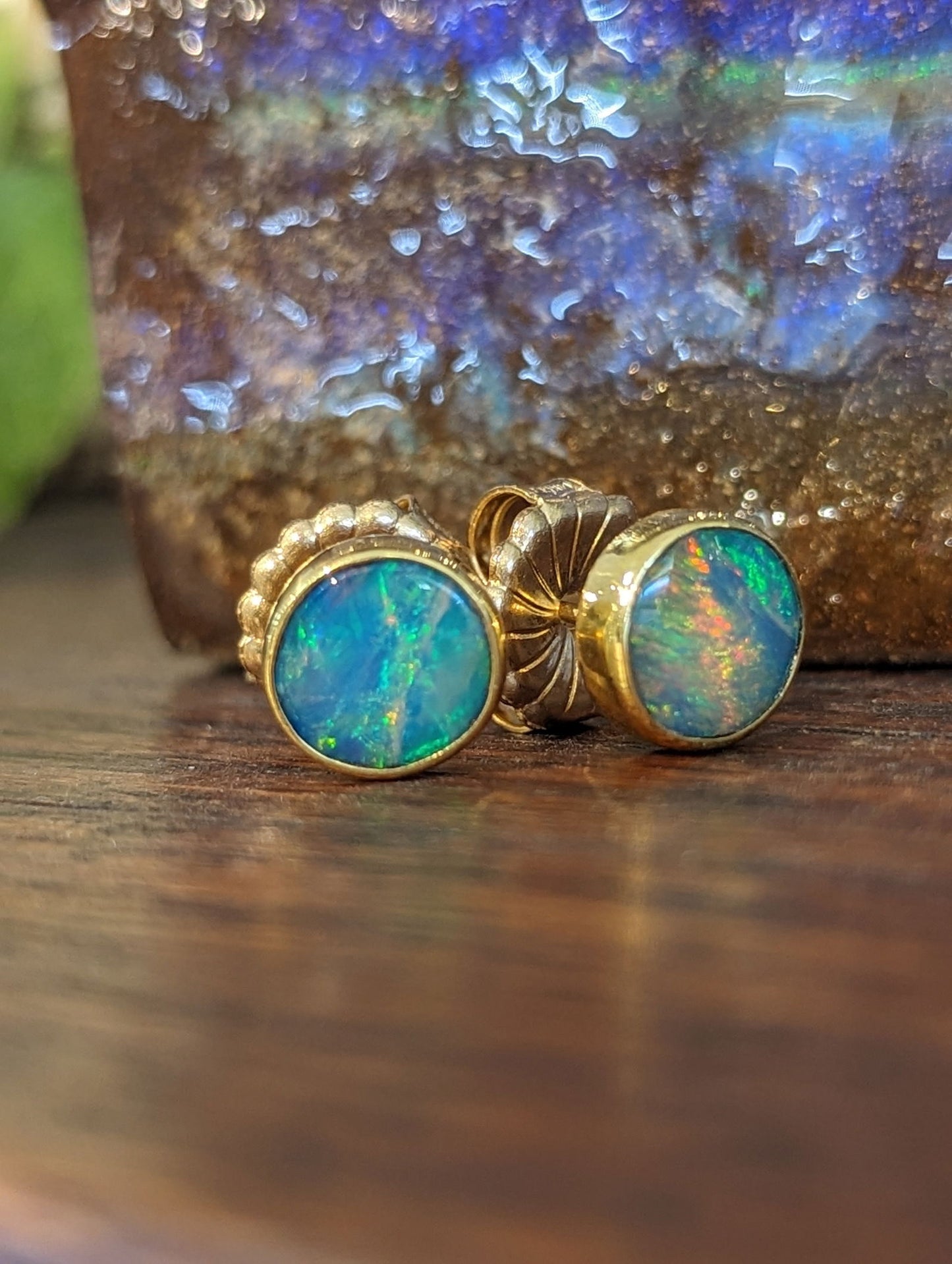 Photo of Opal Studs in a decorative scene, designed by , available at Plumb Gold & Plumb Silver