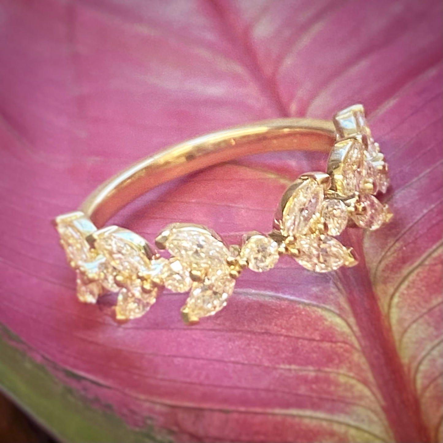 Photo of "Orla" Gold Diamond Band in a decorative scene, designed by -, available at Plumb Gold & Plumb Silver