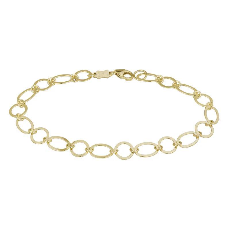 Photo of Ovals Link Bracelet in a decorative scene, designed by , available at Plumb Gold & Plumb Silver
