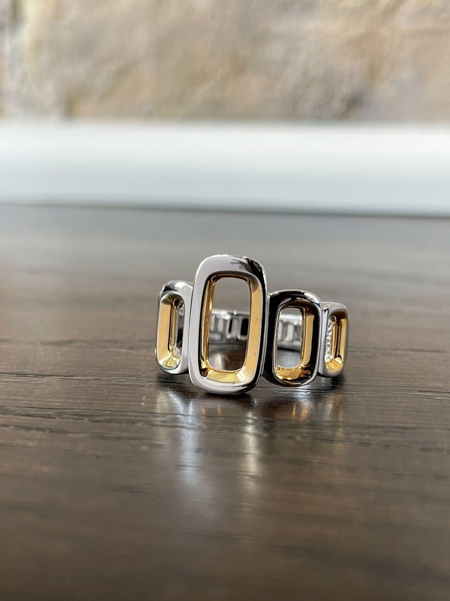 Photo of Ovals Ring in a decorative scene, designed by , available at Plumb Gold & Plumb Silver