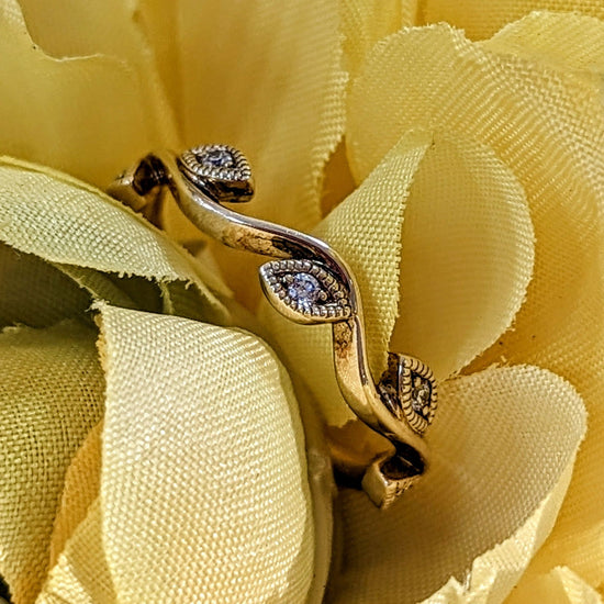 Photo of "Patsy" Band in a decorative scene, designed by , available at Plumb Gold & Plumb Silver
