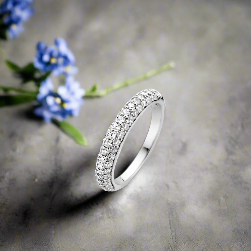 Photo of Pave Dazzle Ring in a decorative scene, designed by , available at Plumb Gold & Plumb Silver