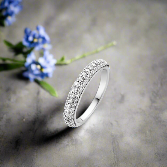Photo of Pave Dazzle Ring in a decorative scene, designed by , available at Plumb Gold & Plumb Silver