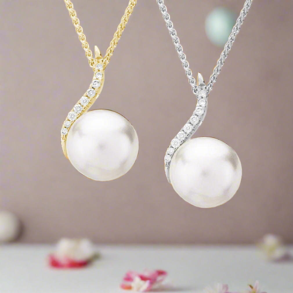 Photo of Pearl and Diamond Necklace in a decorative scene, designed by , available at Plumb Gold & Plumb Silver
