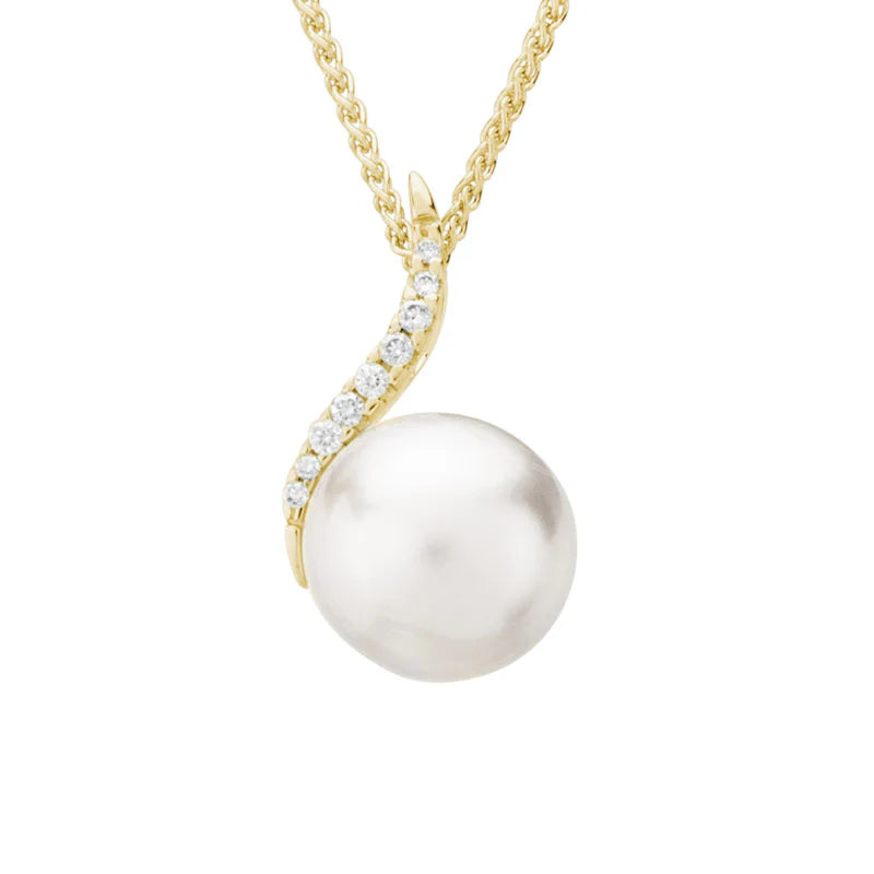 Photo of Pearl and Diamond Necklace in a decorative scene, designed by , available at Plumb Gold & Plumb Silver