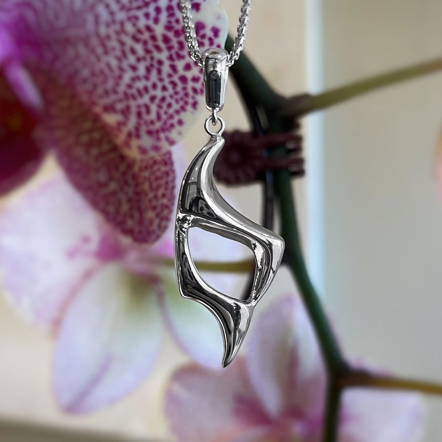 Photo of Pendant Mounting in a decorative scene, designed by , available at Plumb Gold & Plumb Silver