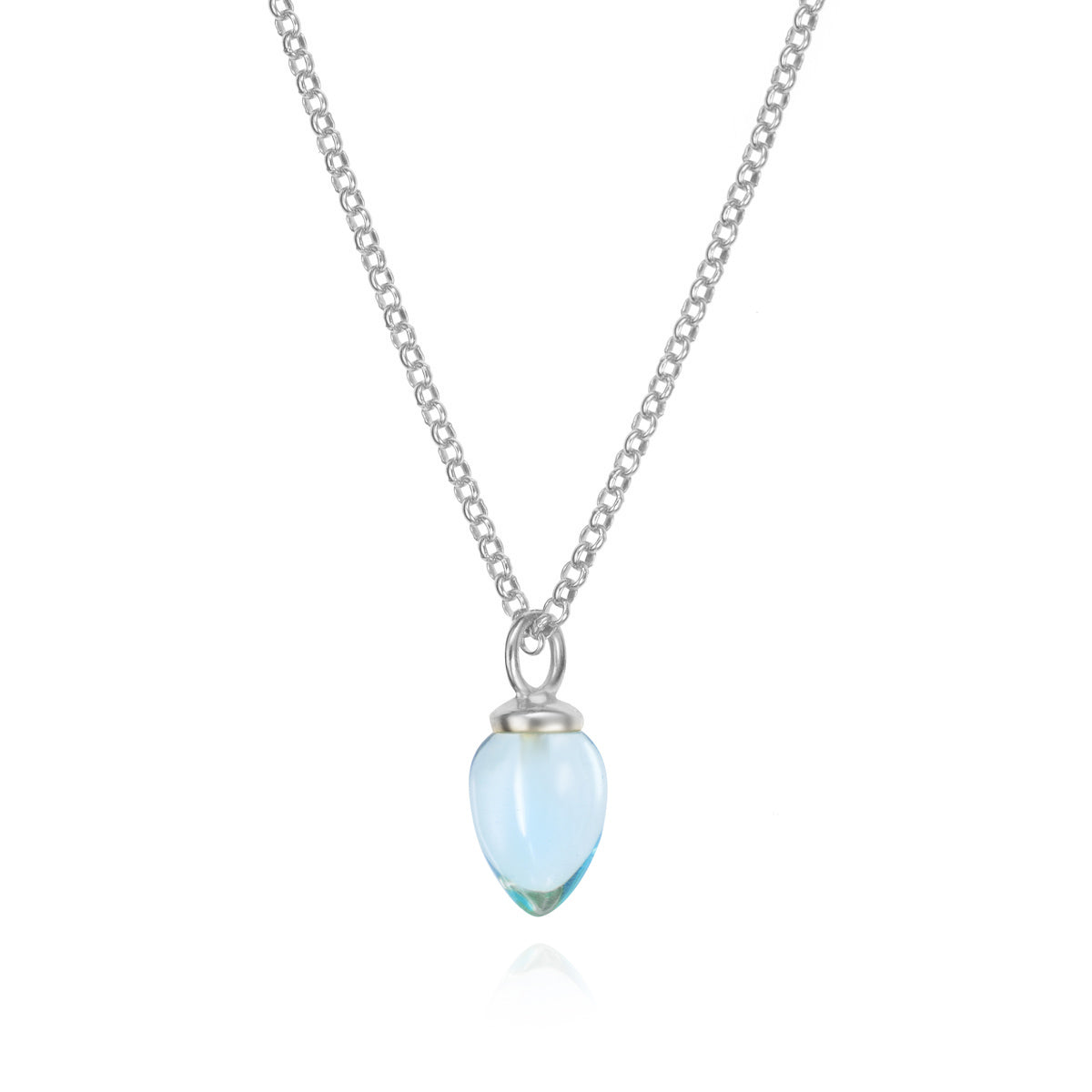 Photo of "Pendulum" pendant in a decorative scene, designed by -, available at Plumb Gold & Plumb Silver