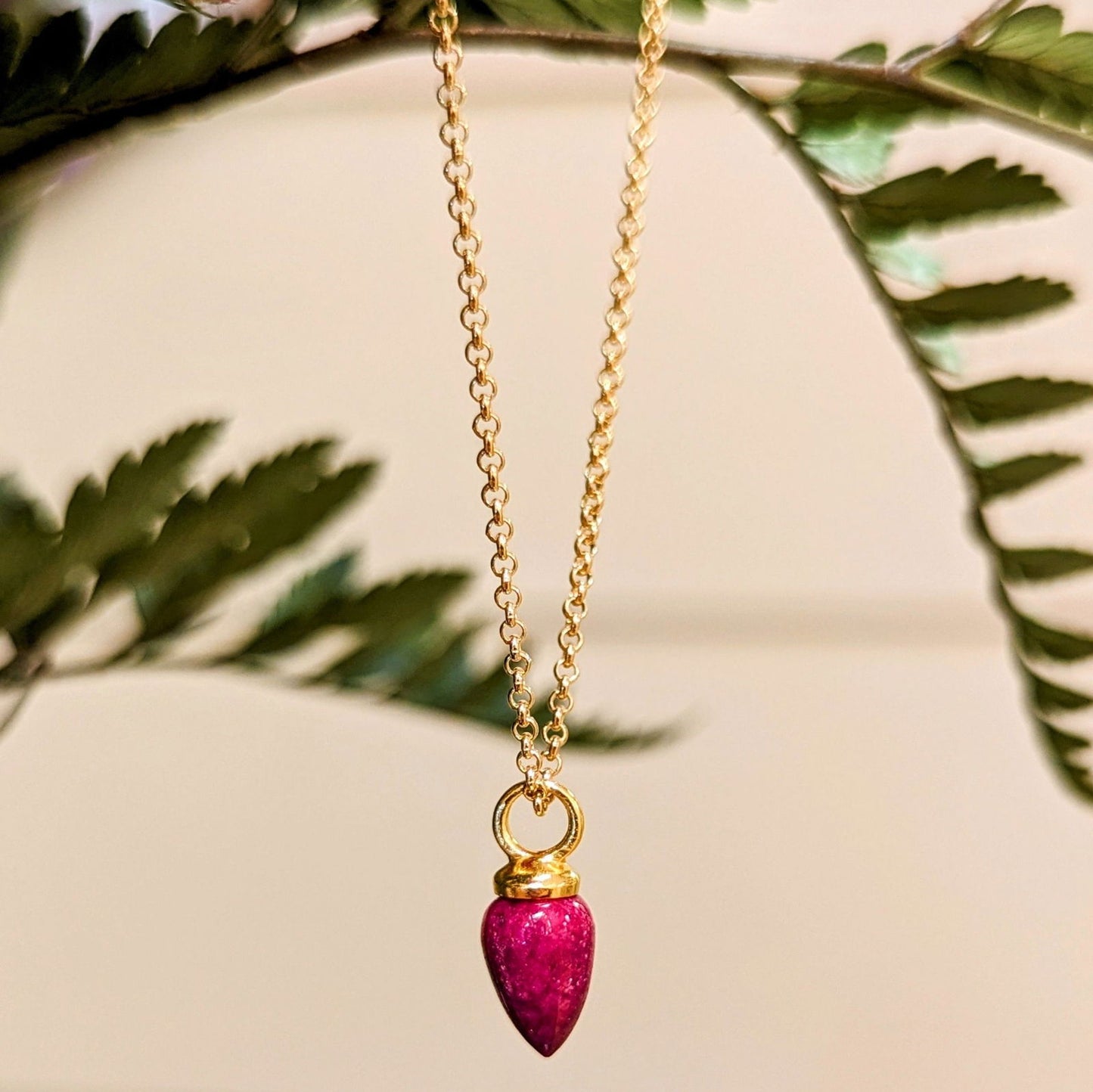 Photo of "Pendulum" pendant in a decorative scene, designed by , available at Plumb Gold & Plumb Silver
