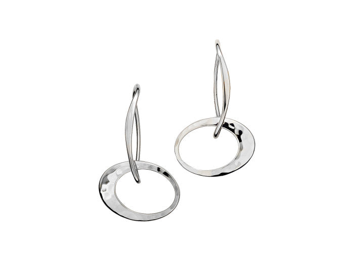 Photo of "Petite Elliptical" Earrings in a decorative scene, designed by , available at Plumb Gold & Plumb Silver