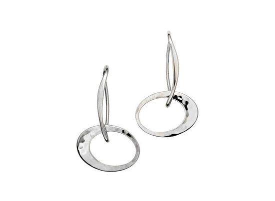 Photo of "Petite Elliptical" Earrings in a decorative scene, designed by , available at Plumb Gold & Plumb Silver