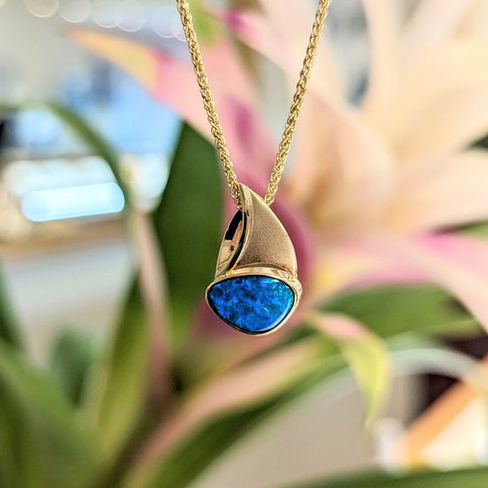 Photo of Petite Opal Sailboat in a decorative scene, designed by , available at Plumb Gold & Plumb Silver