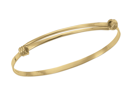 Photo of "Petite Signature" Bracelet in a decorative scene, designed by , available at Plumb Gold & Plumb Silver