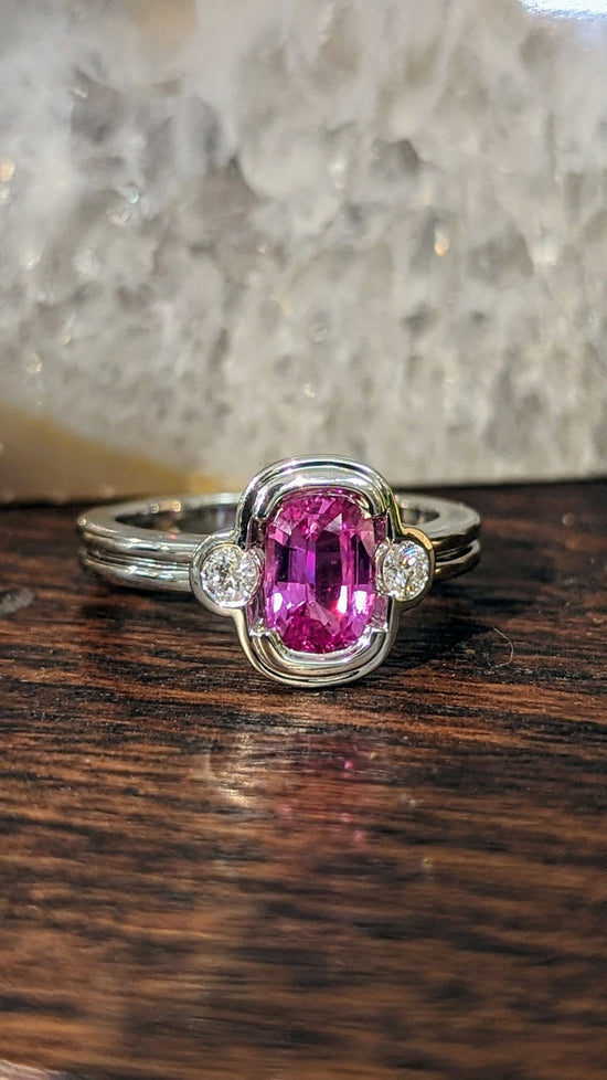 Photo of Pink Sapphire Ring in a decorative scene, designed by , available at Plumb Gold & Plumb Silver