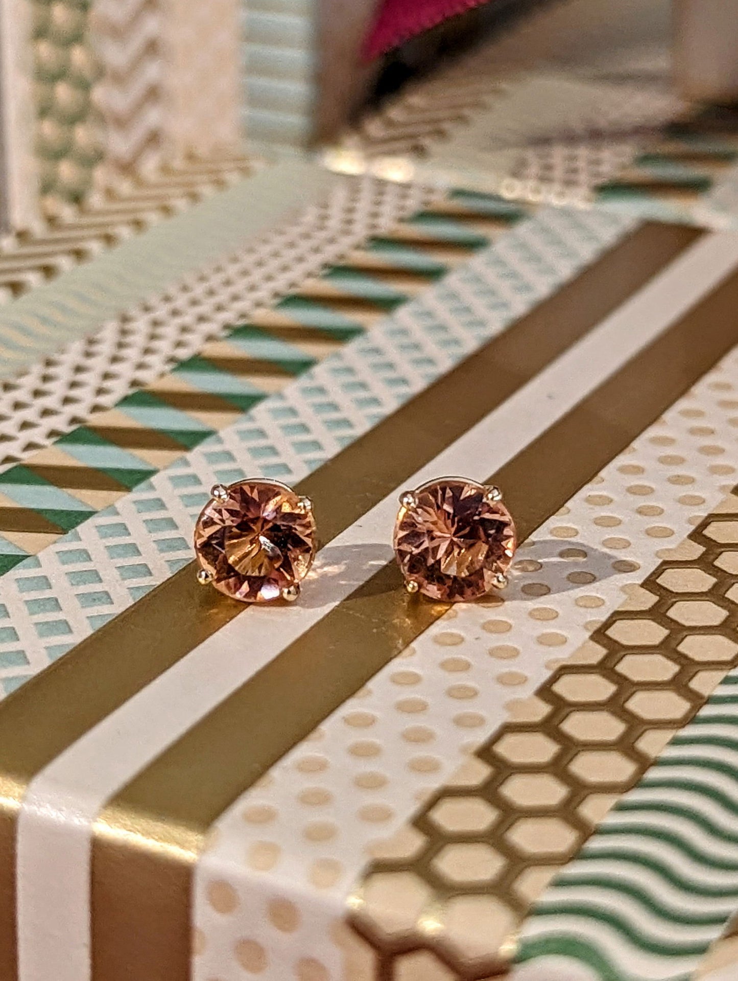 Photo of Plumb Gold Original Imperial Topaz Studs in a decorative scene, designed by , available at Plumb Gold & Plumb Silver