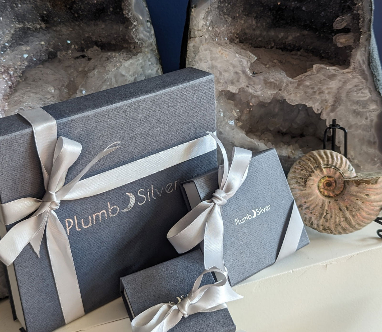 Photo of Plumb Gold & Plumb Silver Gift Certificate in a decorative scene, designed by , available at Plumb Gold & Plumb Silver