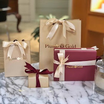 Photo of Plumb Gold & Plumb Silver Gift Certificate in a decorative scene, designed by , available at Plumb Gold & Plumb Silver