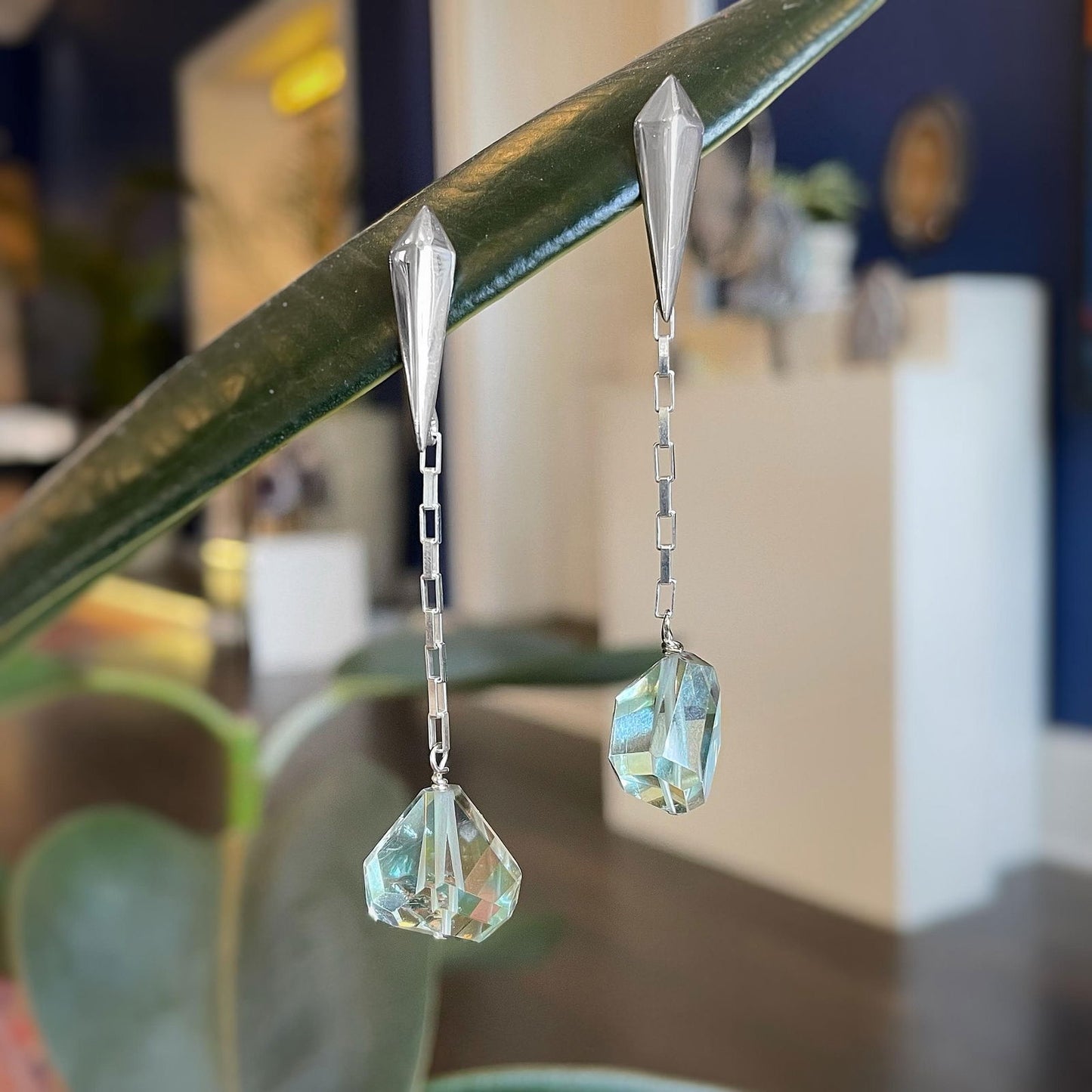 Photo of Plumb Silver Original Green Quartz Dangles in a decorative scene, designed by , available at Plumb Gold & Plumb Silver