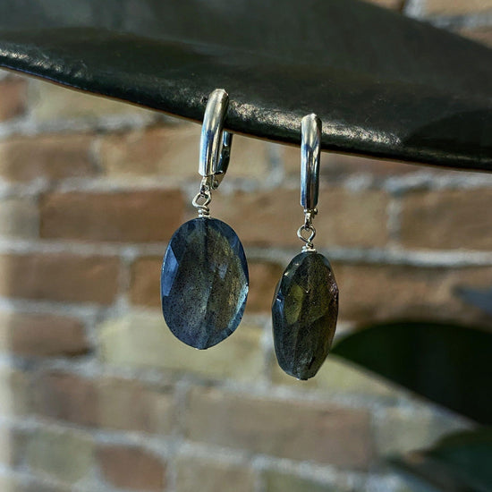 Photo of Plumb Silver Original Labradorite Dangle Earring in a decorative scene, designed by , available at Plumb Gold & Plumb Silver