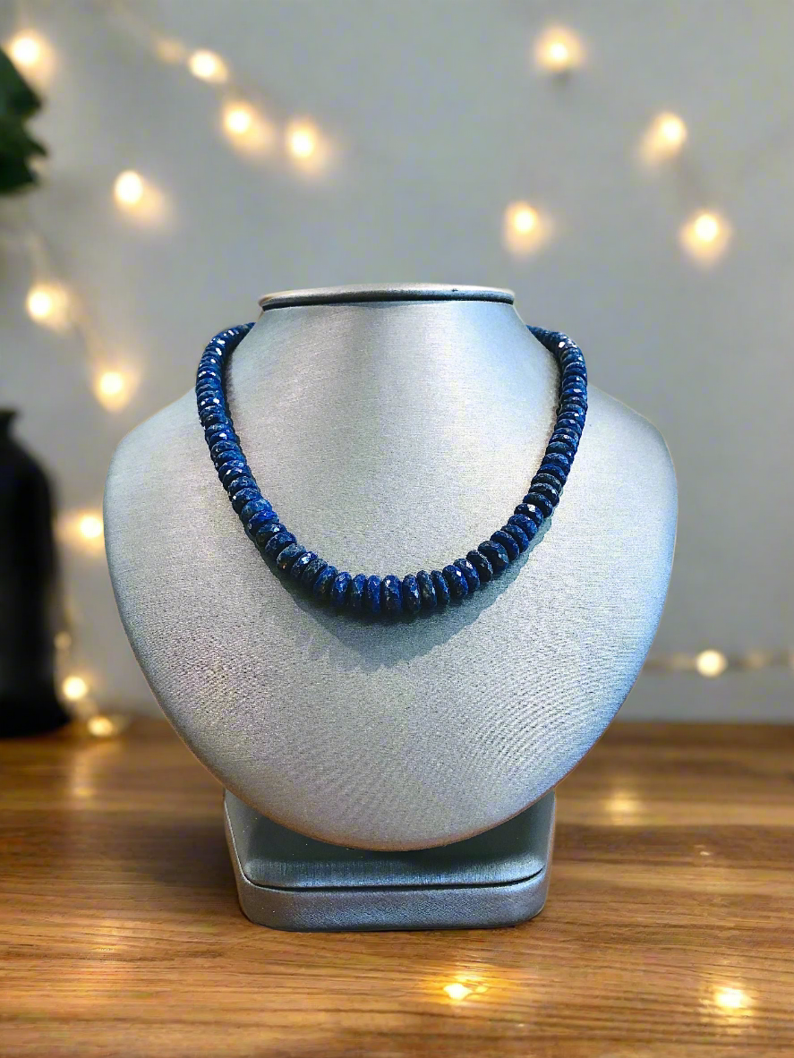 Photo of Plumb Silver Original Lapis Necklace in a decorative scene, designed by , available at Plumb Gold & Plumb Silver