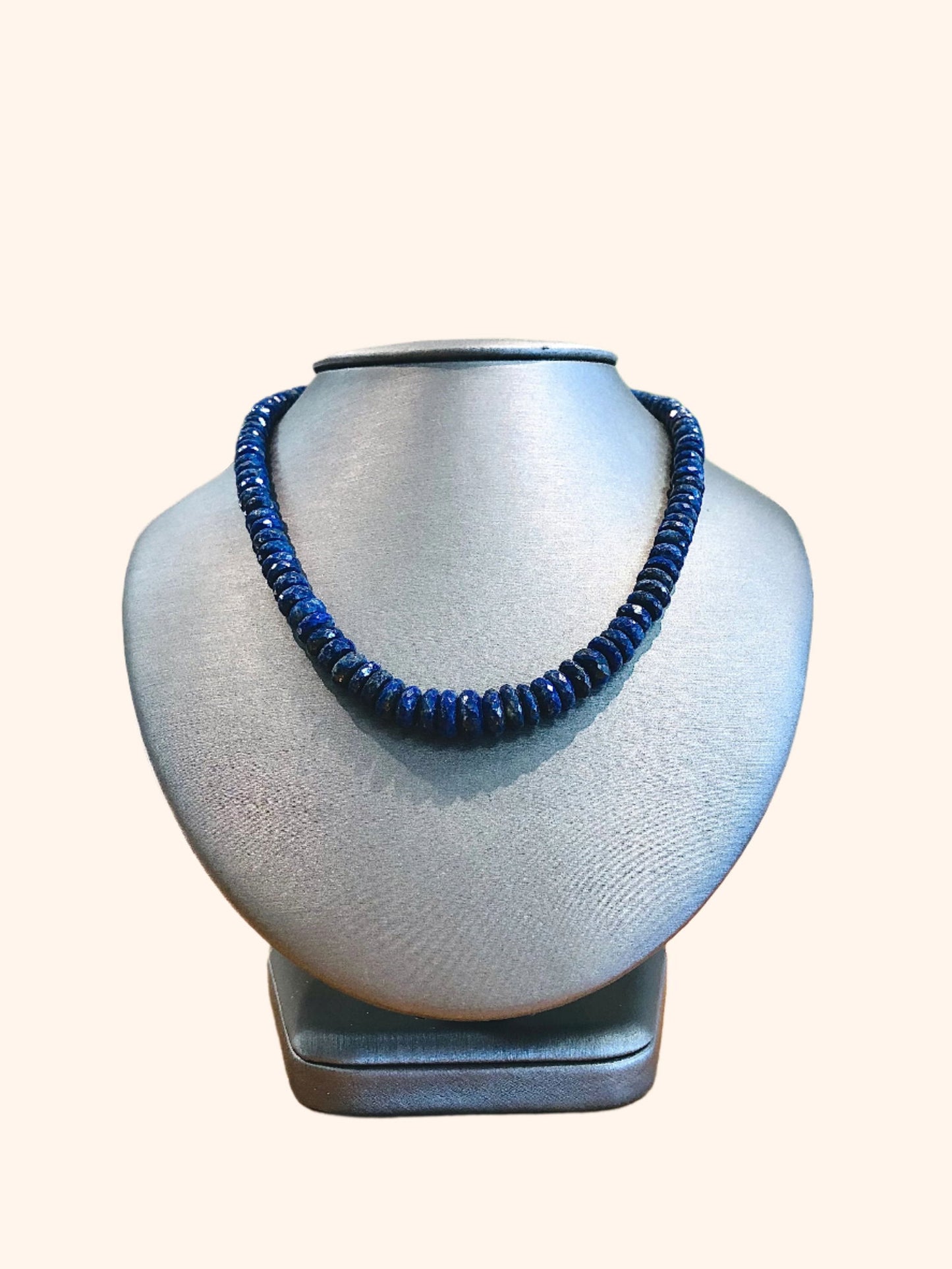 Photo of Plumb Silver Original Lapis Necklace in a decorative scene, designed by , available at Plumb Gold & Plumb Silver