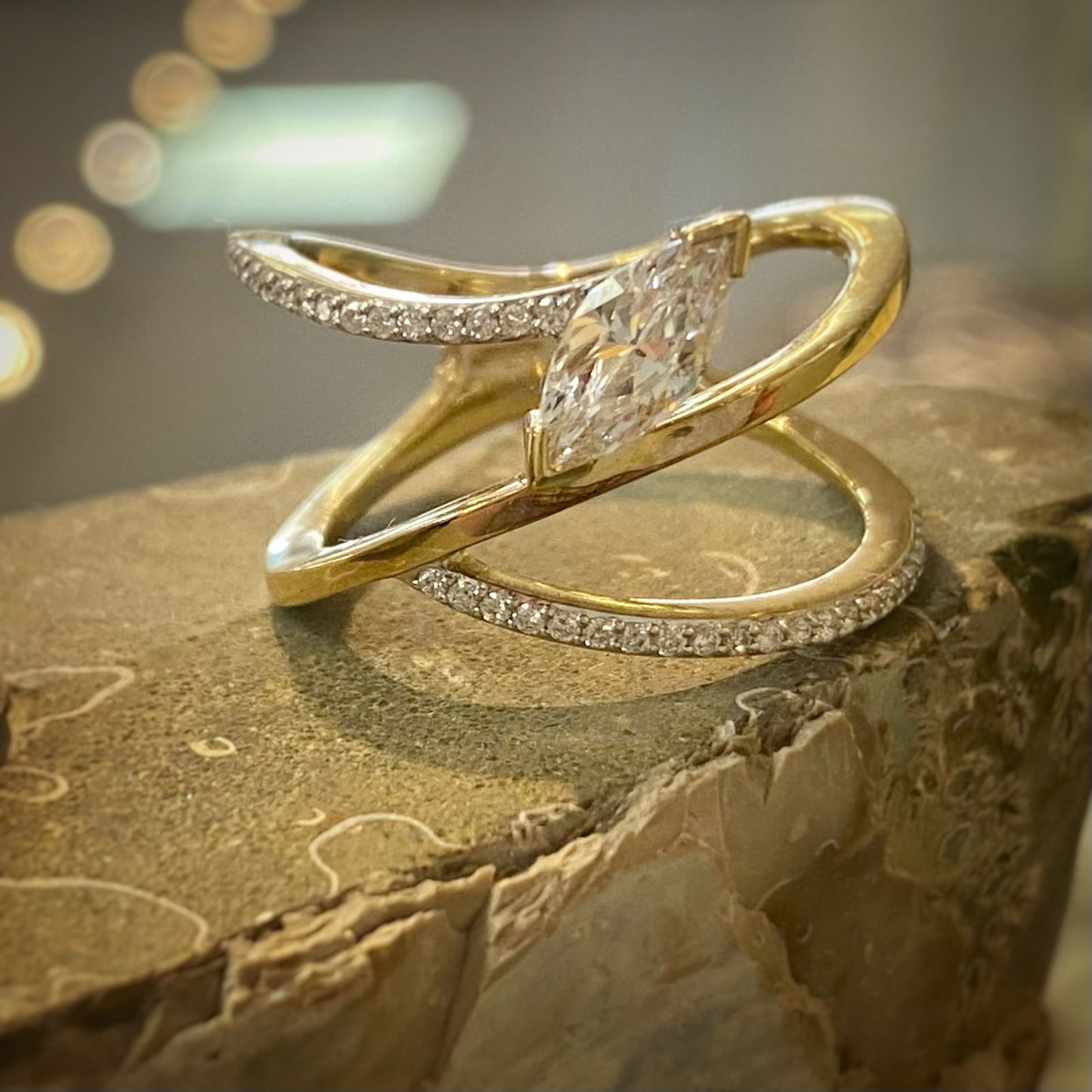 Photo of Renee Marquis Ring in a decorative scene, designed by , available at Plumb Gold & Plumb Silver