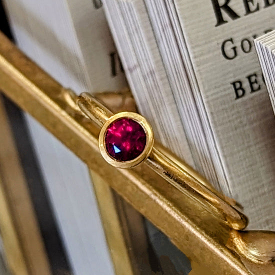Photo of Ruby Yumdrop in a decorative scene, designed by , available at Plumb Gold & Plumb Silver
