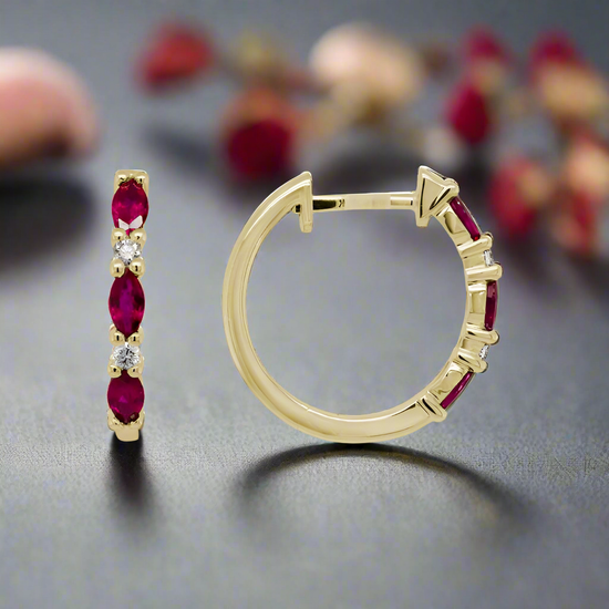 Photo of Ruby and Diamond Hoops in a decorative scene, designed by , available at Plumb Gold & Plumb Silver