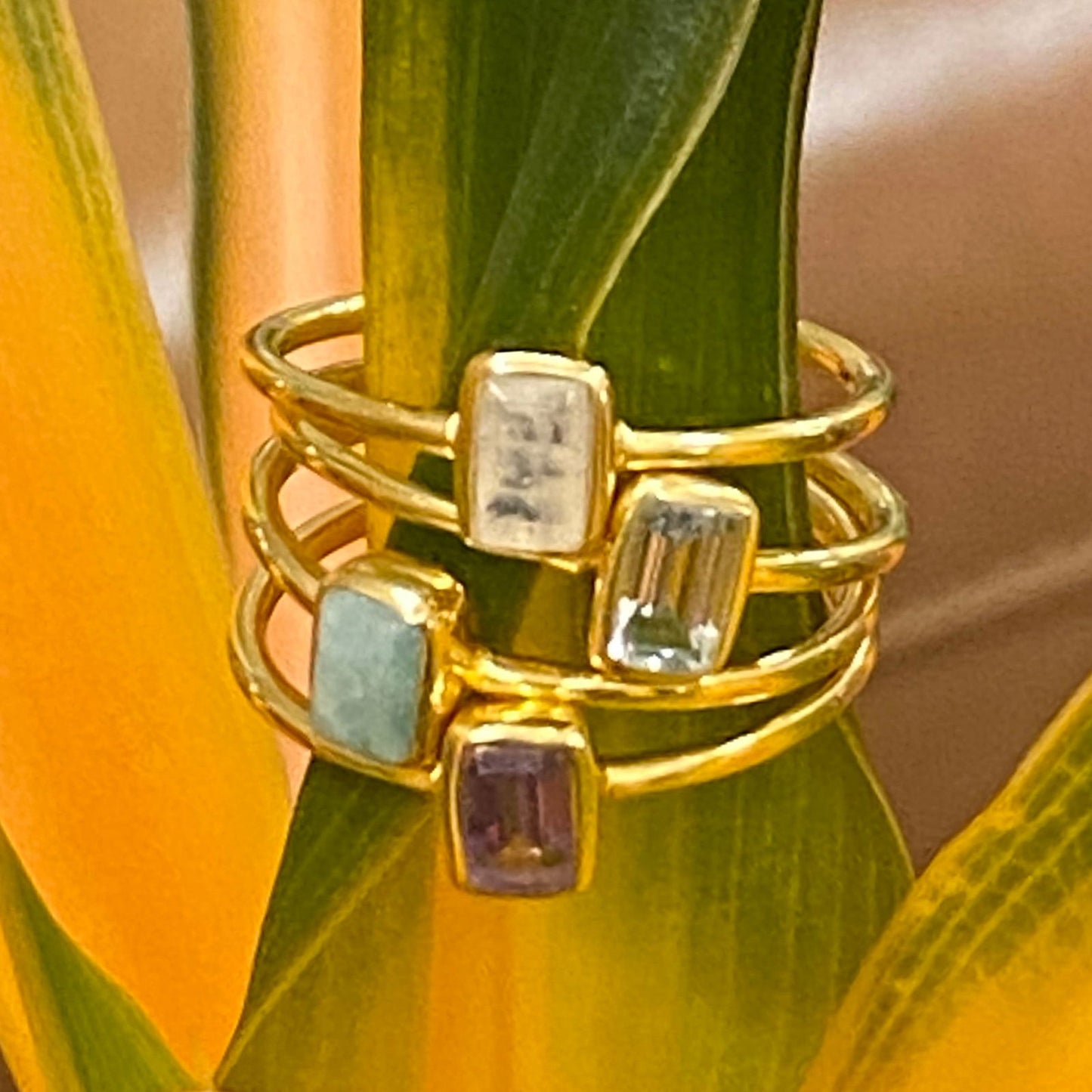 Photo of "Shade" Ring in a decorative scene, designed by , available at Plumb Gold & Plumb Silver