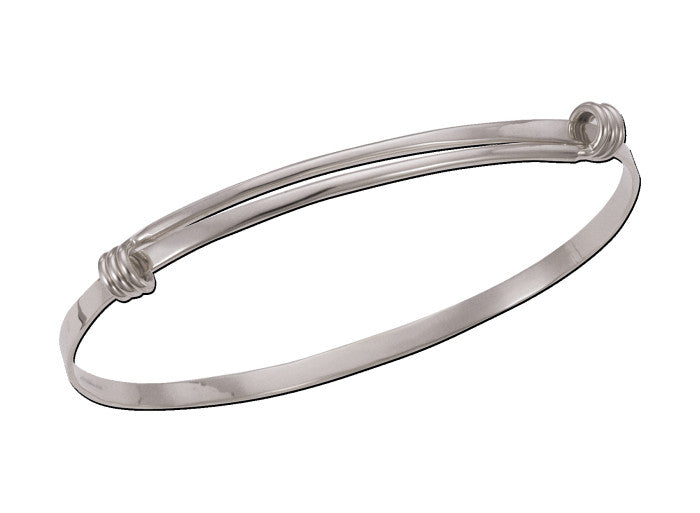 Photo of "Signature" Bracelet in a decorative scene, designed by , available at Plumb Gold & Plumb Silver