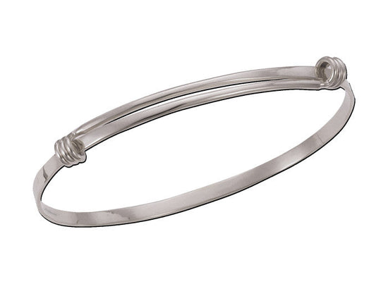 Photo of "Signature" Bracelet in a decorative scene, designed by , available at Plumb Gold & Plumb Silver