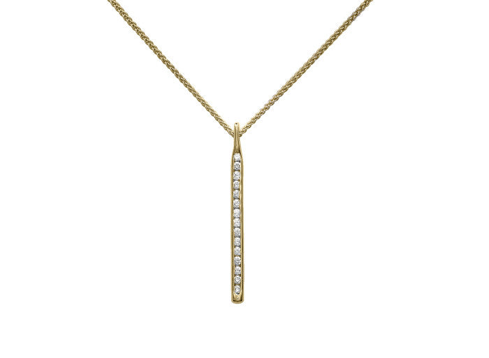 Photo of "Sparkler" Diamond Pendant in a decorative scene, designed by , available at Plumb Gold & Plumb Silver
