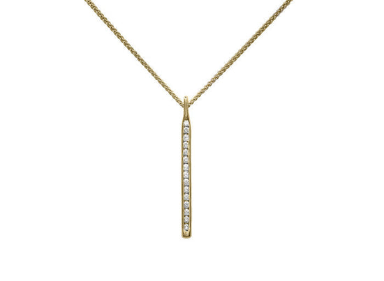 Photo of "Sparkler" Diamond Pendant in a decorative scene, designed by , available at Plumb Gold & Plumb Silver