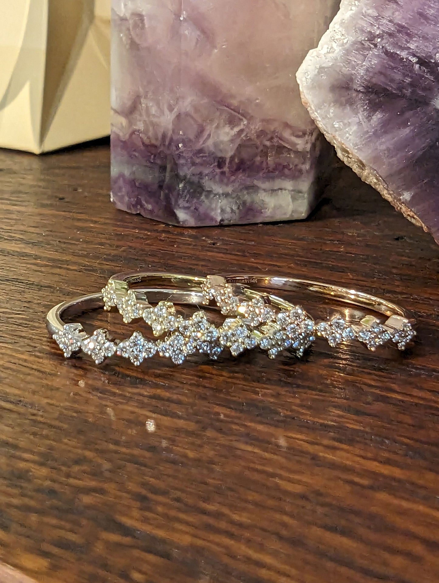 Photo of Stackable Rings in a decorative scene, designed by , available at Plumb Gold & Plumb Silver