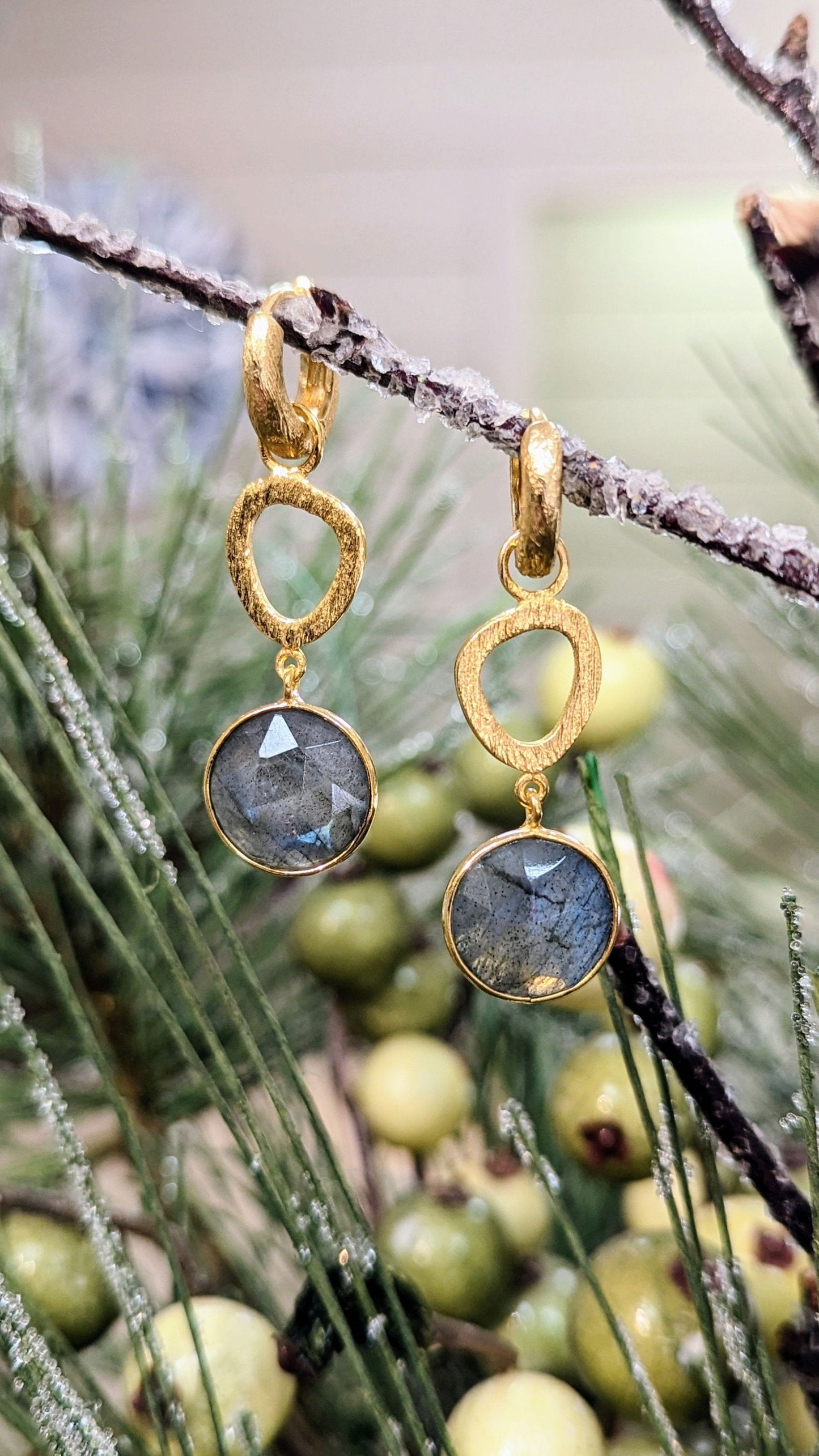 Photo of Sterling Gold Plated Labradorite Convertible Dangles in a decorative scene, designed by , available at Plumb Gold & Plumb Silver