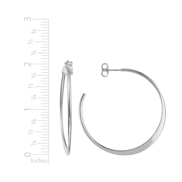 Photo of Tapered Hoops in a decorative scene, designed by , available at Plumb Gold & Plumb Silver