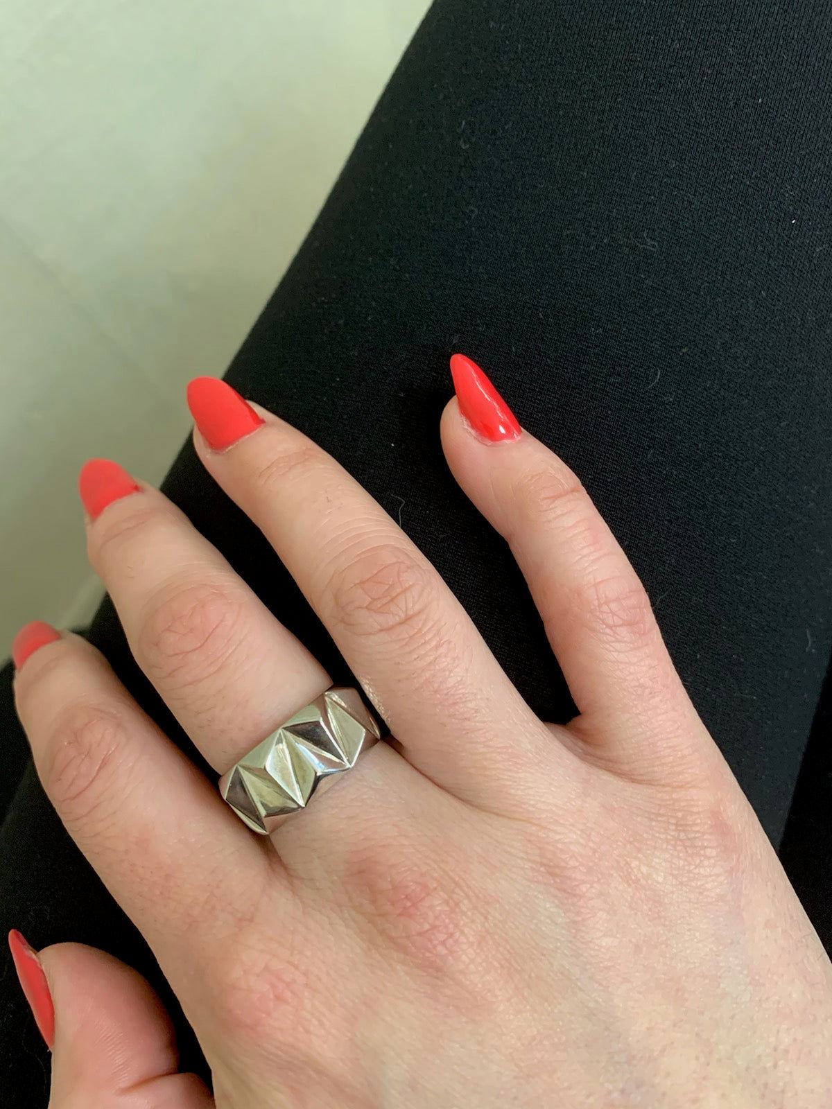 Photo of Ti Sento Geometric Ring in a decorative scene, designed by , available at Plumb Gold & Plumb Silver
